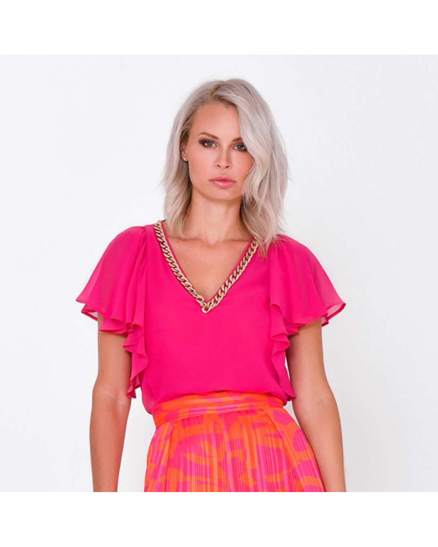 Conjunto fresa y naranja detalle cadenas