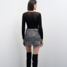 Jersey negro canalé transparencia