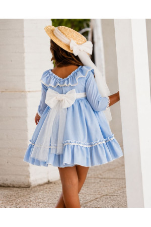 Vestido ceremonia celeste con acabados en crudo