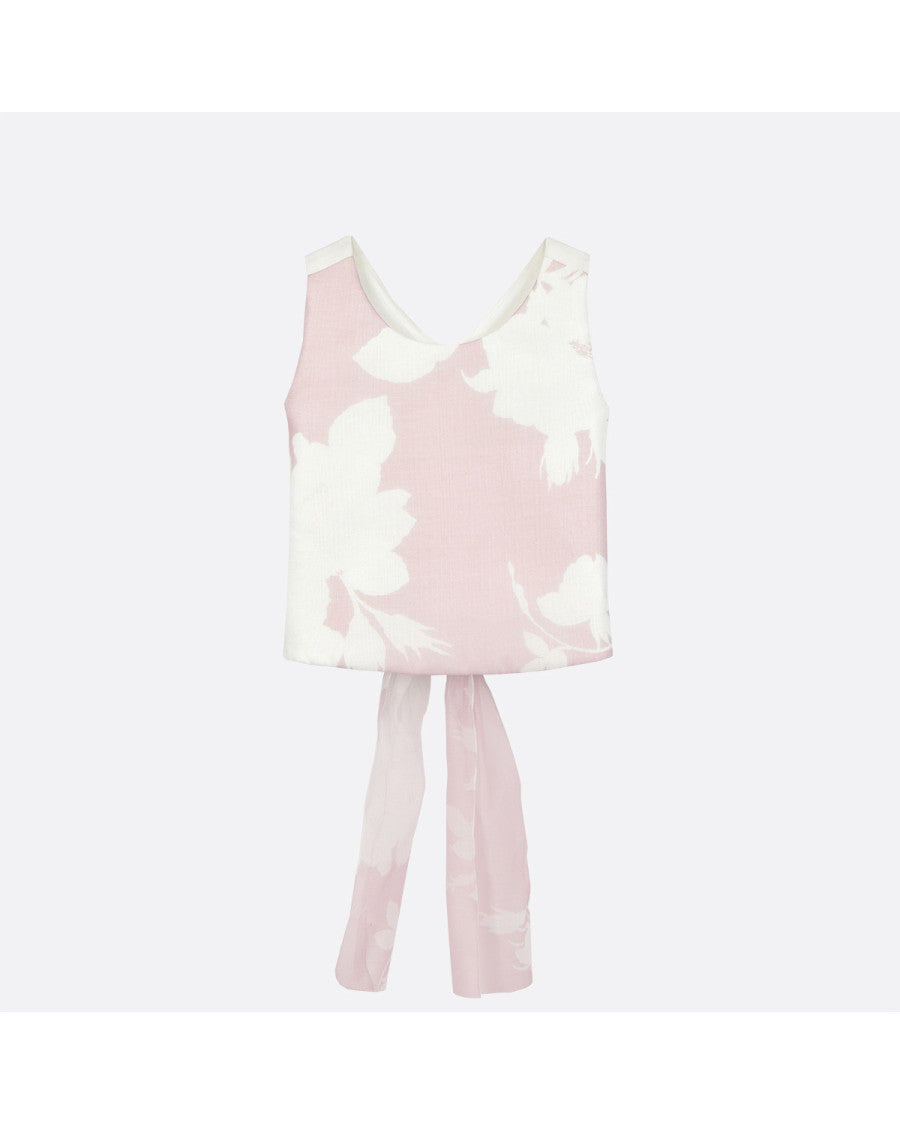 Conjunto top estampado rosa y pantalón.