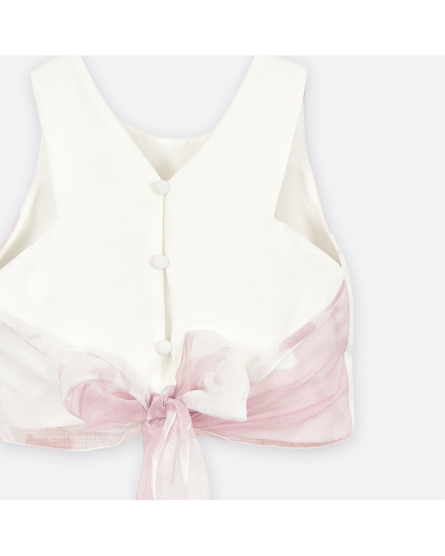 Conjunto top estampado rosa y pantalón.