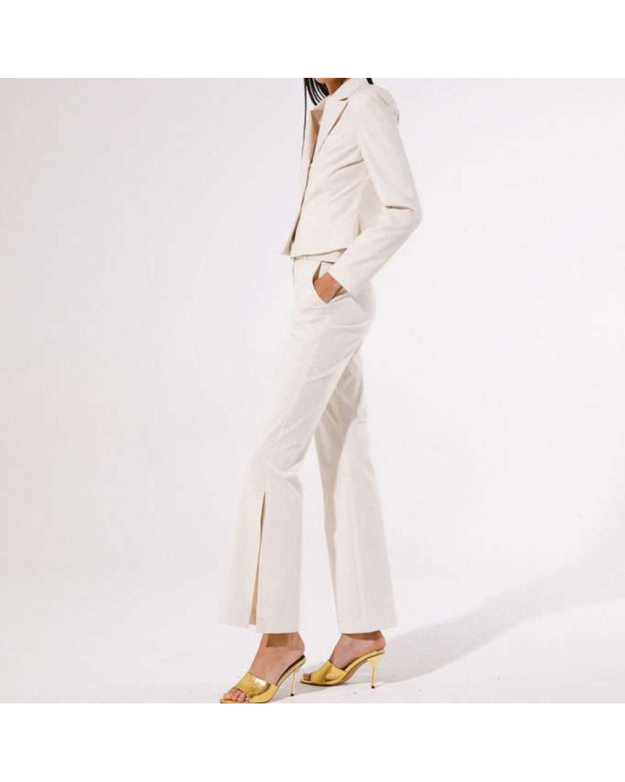 Pantalón beige con cinturón joya