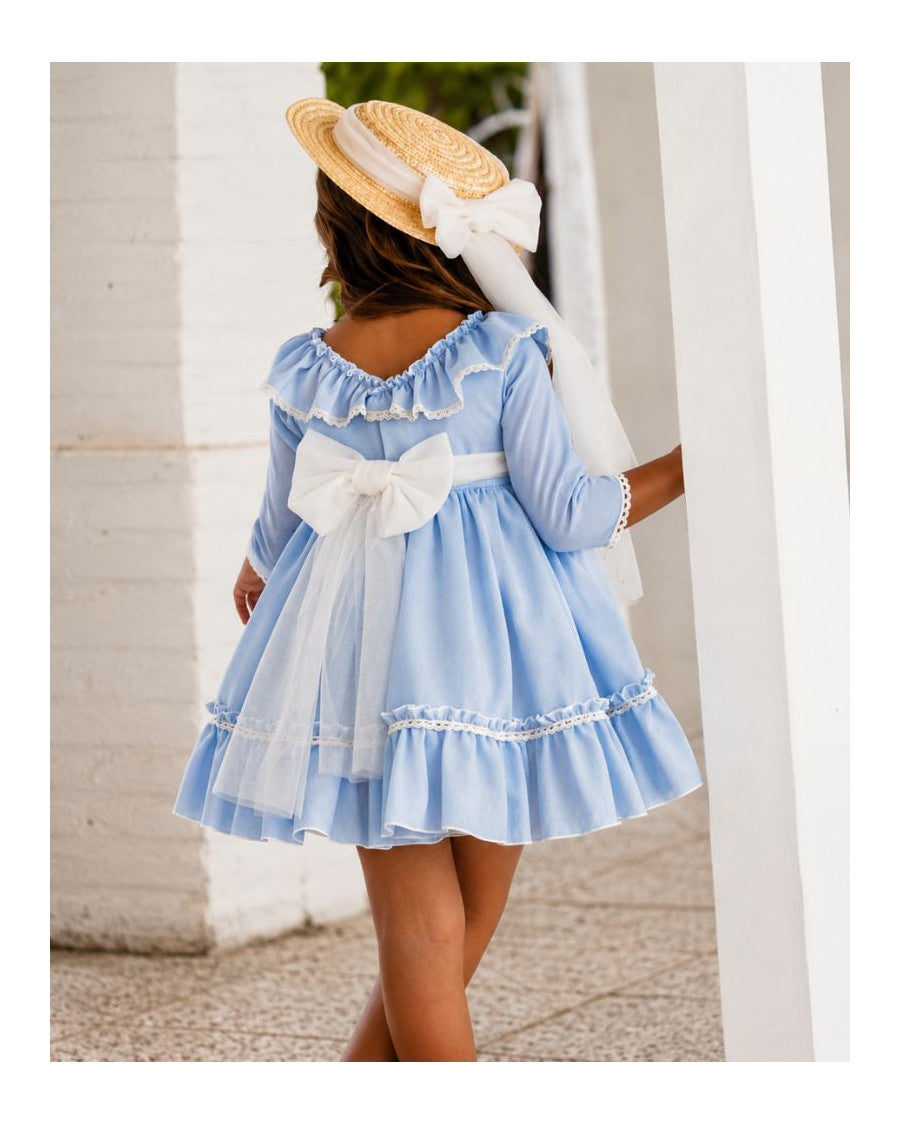 Vestido ceremonia celeste con acabados en crudo